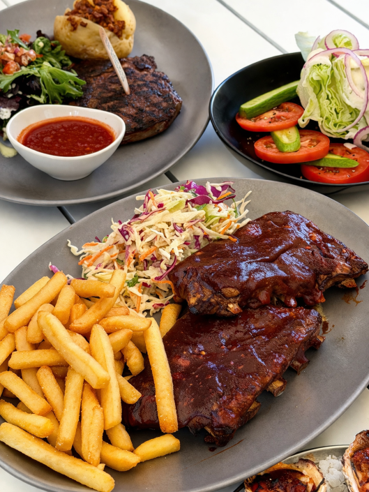 Ribs, steak and salad
